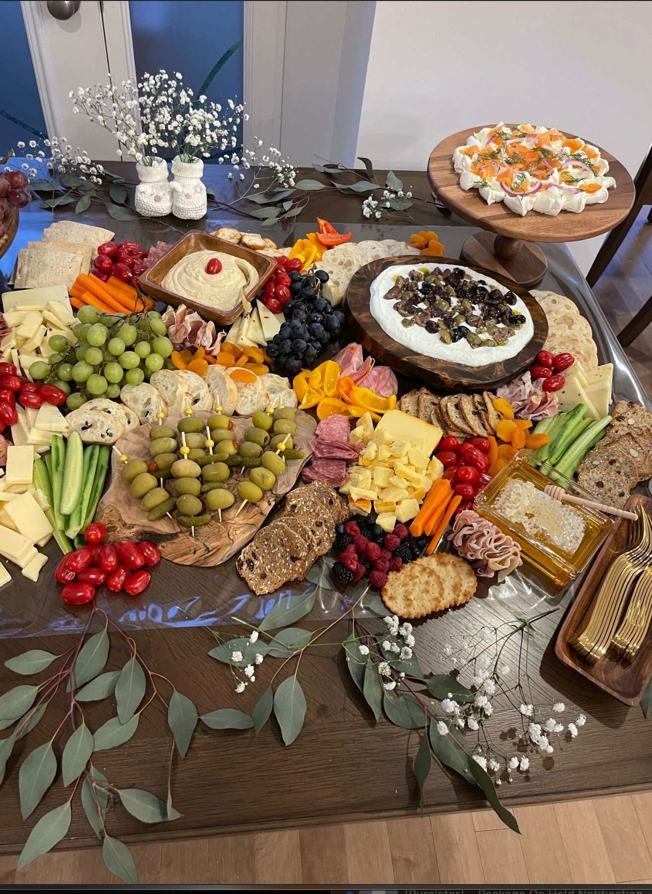 Artfully arranged grazing table with cheeses and accompaniments